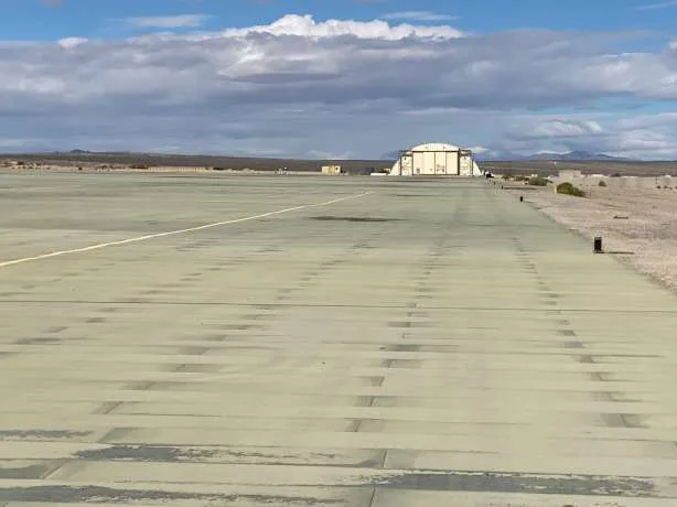 Failed competitor concrete mat — pre-remediation