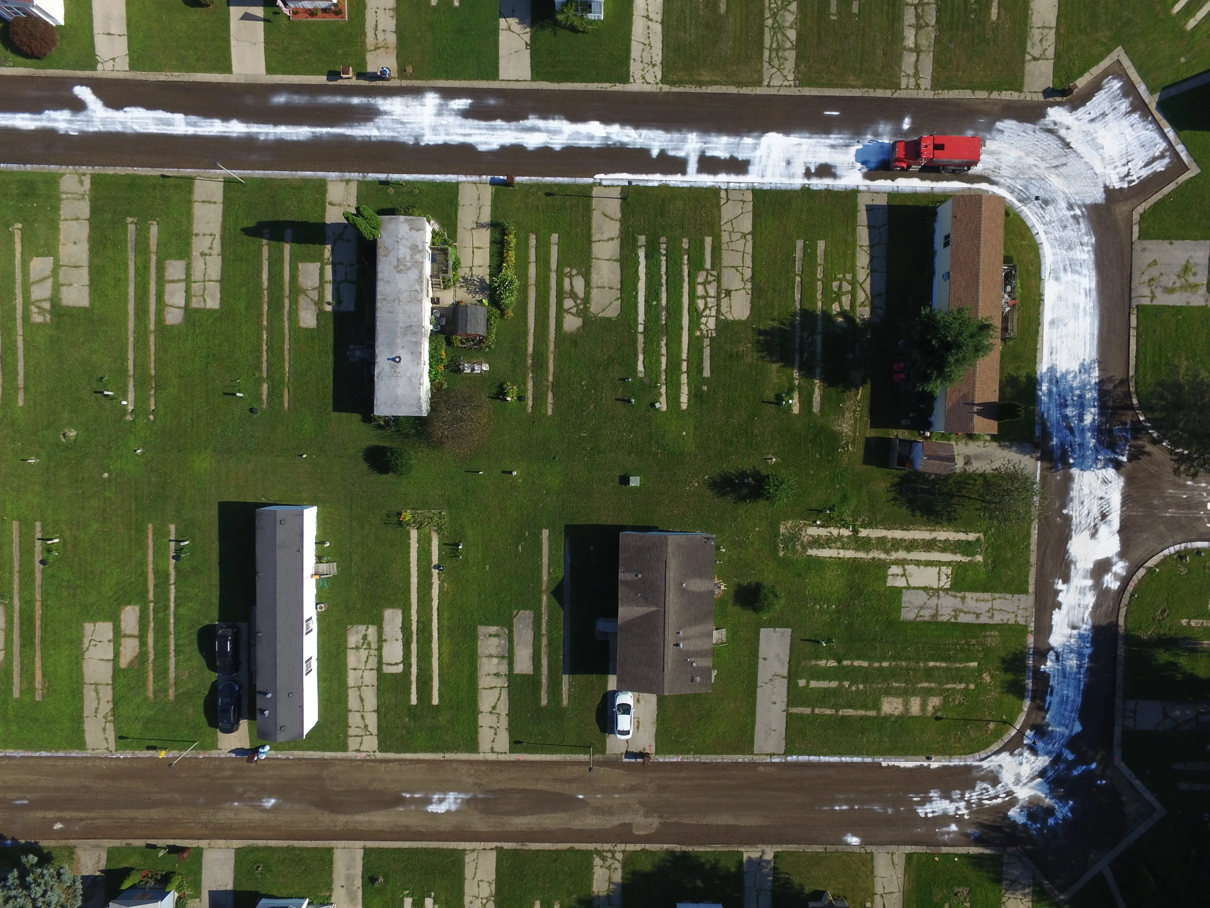 Aerial view of a community roadway integrated into its surrounding landscape